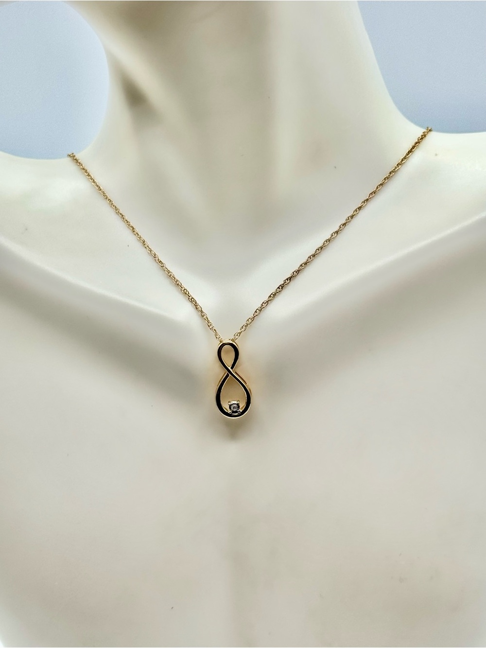 Yellow Gold Infinity Pendant Necklace with One Diamond Accent Stone